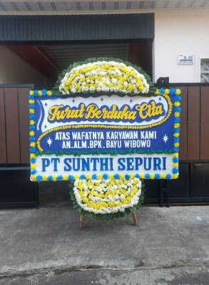 Papan Bunga Duka di Tengah Tani